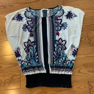 Cute blouse, Ricki’s size Large